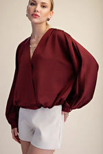 Burgundy V-neck blouse bubble hem