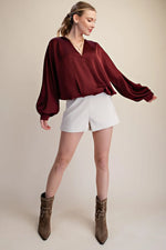 Burgundy V-neck blouse bubble hem