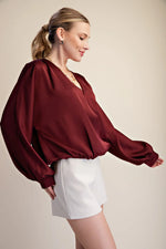 Burgundy V-neck blouse bubble hem