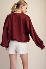 Burgundy V-neck blouse bubble hem