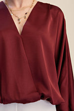 Burgundy V-neck blouse bubble hem