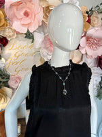 Sleeveless Top with frilled neck