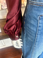 Burgundy V-neck blouse bubble hem