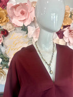 Burgundy V-neck blouse bubble hem