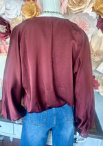 Burgundy V-neck blouse bubble hem